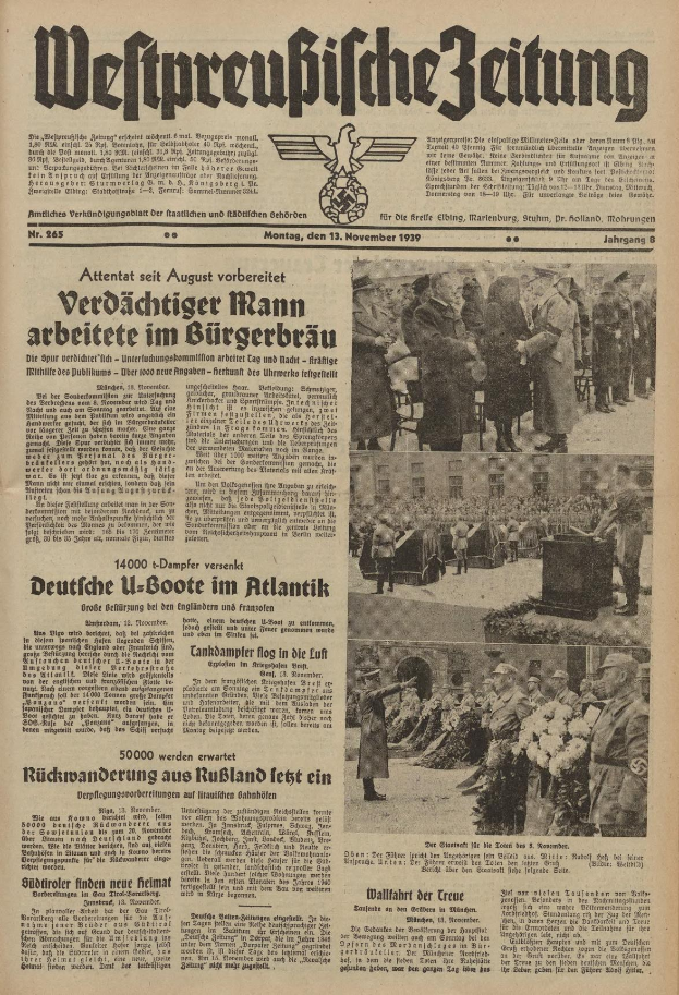 Schwarze Titelseite einer deutschen Zeitung vom 13. November 1939 mit der Überschrift 'Weitpreubliche Zeitung', die eine Gruppe von Menschen in traditioneller deutscher Kleidung in einer feierlichen Atmosphäre zeigt.