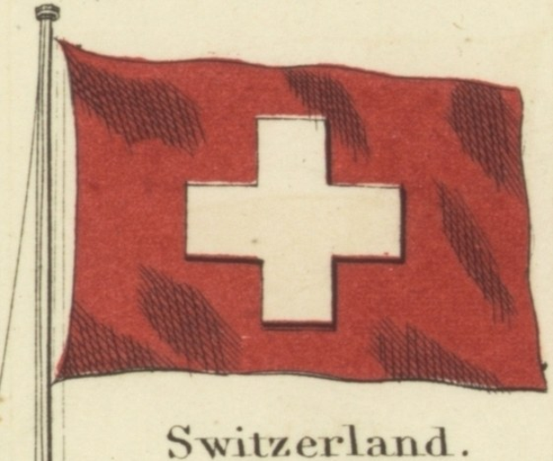 Rote Flagge mit einem weißen Kreuz, das an einem Stab befestigt ist und unten mit "Schweiz" beschriftet ist.